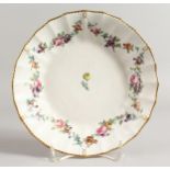 A CHELSEA DERBY SAUCER SHAPED DISH painted in the manner of Withers with chains of flowers.