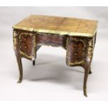 A SUPERB LOUIS XVI DESIGN KINGWOOD AND MARQUETRY COMMODE, the top with leather writing panel, five