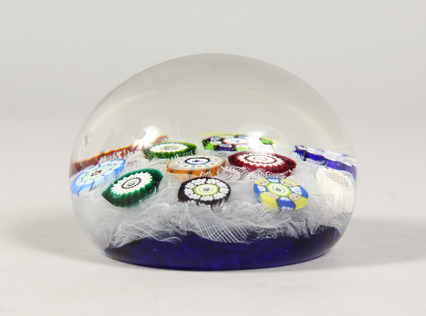 A PERTHSHIRE GLASS MILLEFIORI PAPERWEIGHT. Design PP12. 2.5ins diameter.