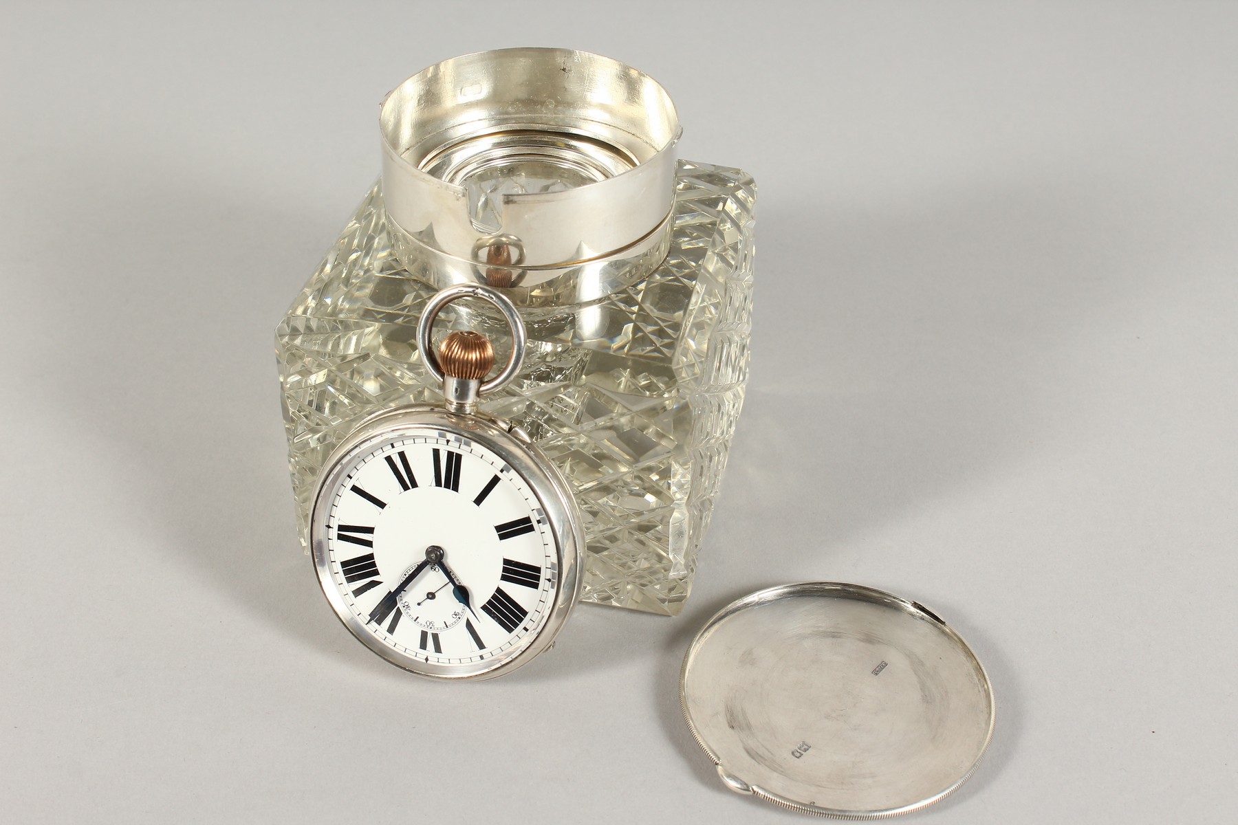 A SILVER AND CUT GLASS SQUARE INKSTAND, the top inset with a watch. 4ins square. London 1903. - Image 3 of 5