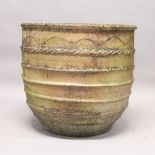 A LARGE TERRACOTTA CIRCULAR JARDINIERE. 2ft 3ins diameter x 1ft 11ins high.