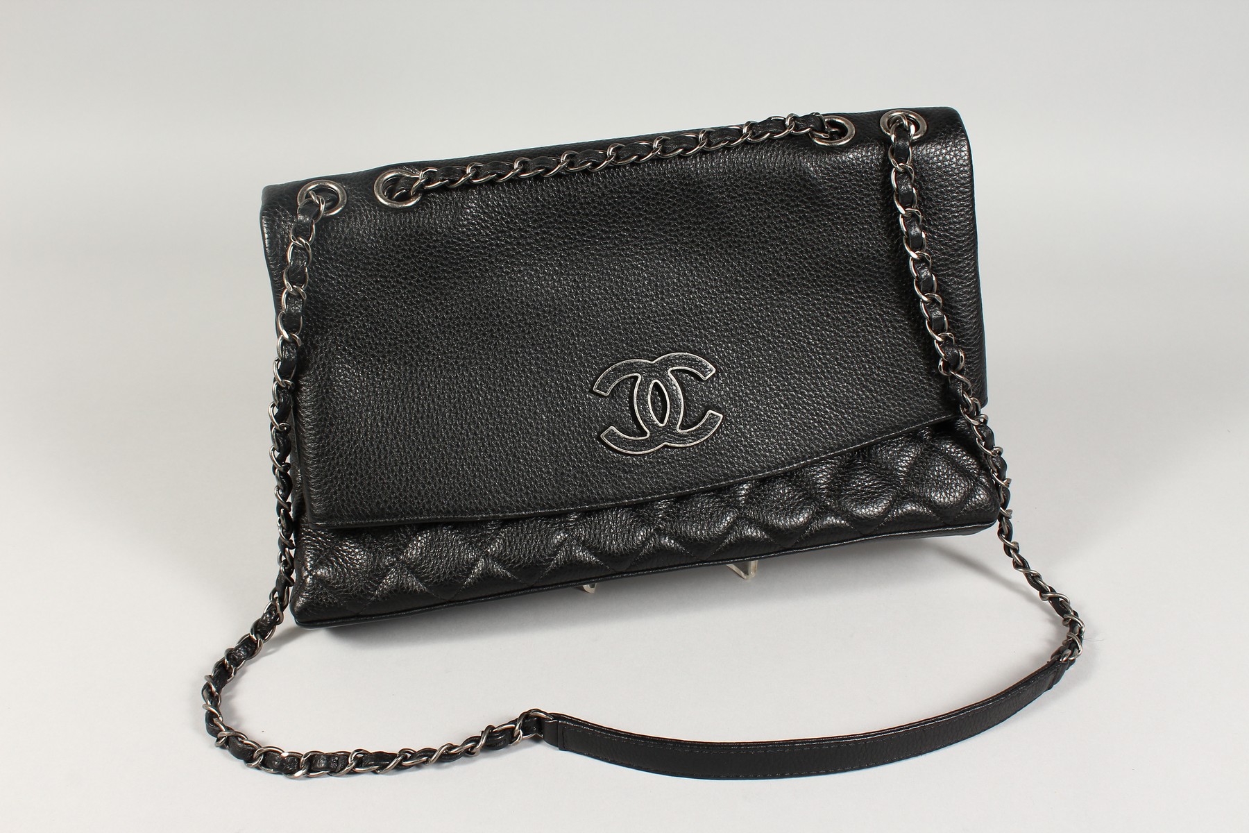 A CHANEL FOLD-UP QUILTED HANDBAG in a Chanel bag. - Image 2 of 11