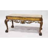 A GOOD FIGURED WALNUT RECTANGULAR COFFEE TABLE, with pierced sides on cabriole legs, on claw and