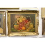 A still life of fruit in a basket with a Chianti bottle, oil on canvas.