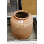 A terracotta rhubarb forcer.