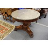 A good 19th century mahogany and marble top circular centre table on a bulbous octagonal shaped