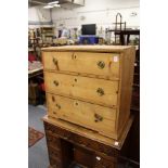 A 19th century pine small three drawer chest.