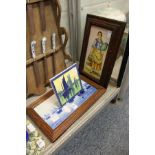 Two framed tile plaques and an unframed tile.