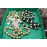 Four decorative bead necklaces.