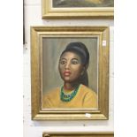 A bust length portrait of a young lady wearing a green bead necklace, oil on canvas.