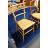 A cane seated occasional chair.