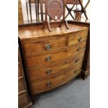 A George III mahogany bow front chest of two short and three graduated long drawers on splay bracket