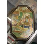 An Indian octagonal shaped lacquer box with pictorial cover.