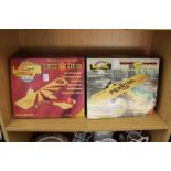 Two limited edition die cast models of aeroplanes, boxed.