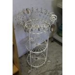 A three tier wirework plant stand.