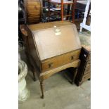 A small oak bureau.