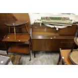 An Ercol occasional table and a 1960's trolley and bookcase unit.