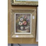 T. Denver, a still life of flowers in a vase, oil on canvas, signed.