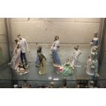 A quantity of Nao, Lladro and other decorative figures.