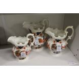 A graduated set of three Imari decorated jugs (from the Murray collection).