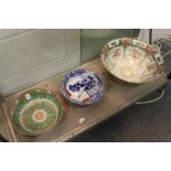 Three Chinese and Japanese bowls.