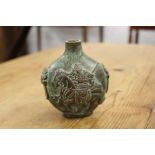A small Chinese bronze twin handled vase.