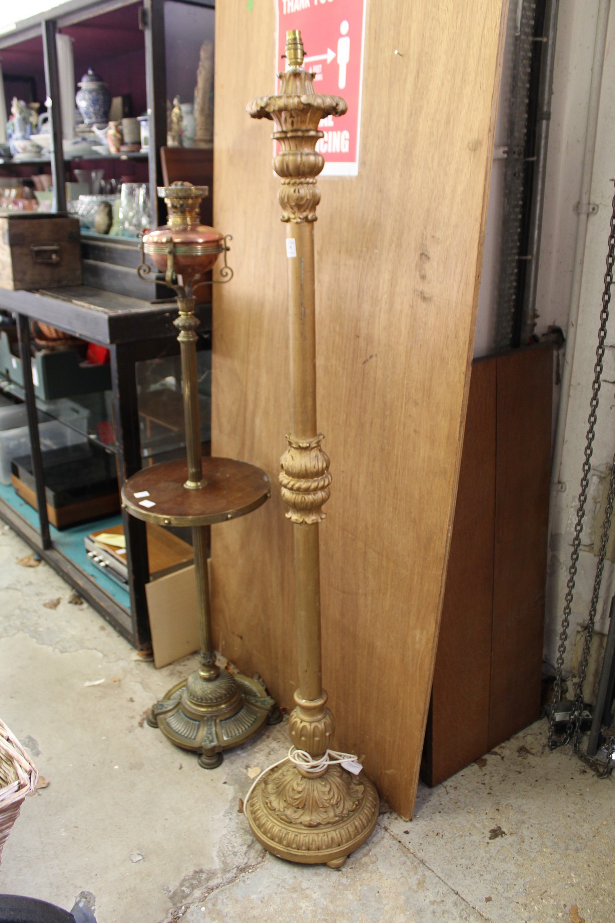 A gilt wood standard lamp.