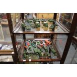 A quantity of military toy vehicles and other die cast toys.