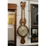 A 19th century mahogany barometer / thermometer with inlaid case with signed silvered dial.