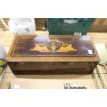 An inlaid wooden music box case.