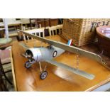 A spirit engine powered model of a bi-plane.