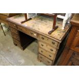 A mahogany pedestal desk.