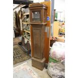 An oak longcase clock case (no movement).