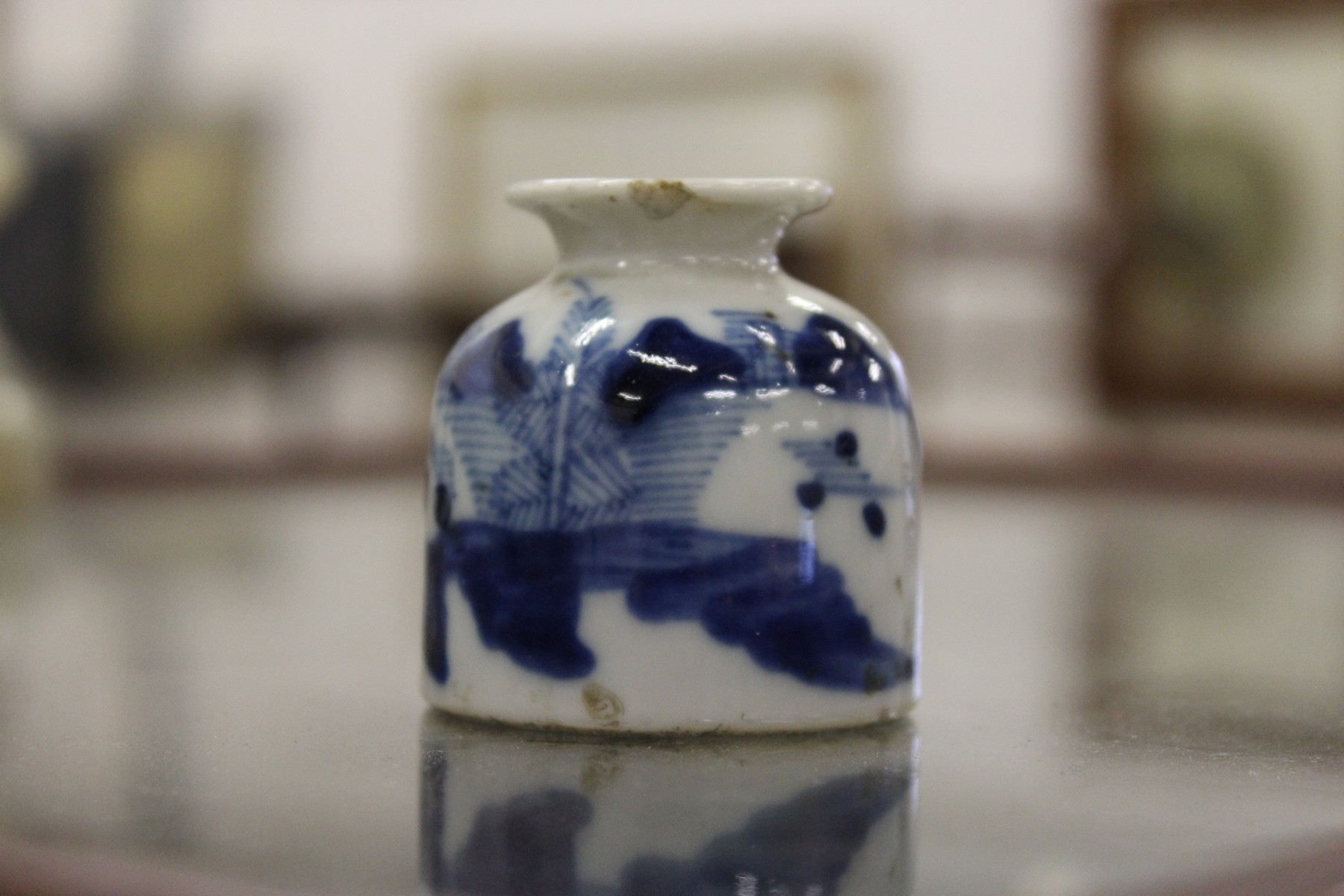 A small 19th century Chinese blue and white porcelain brush wash.
