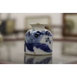 A small 19th century Chinese blue and white porcelain brush wash.