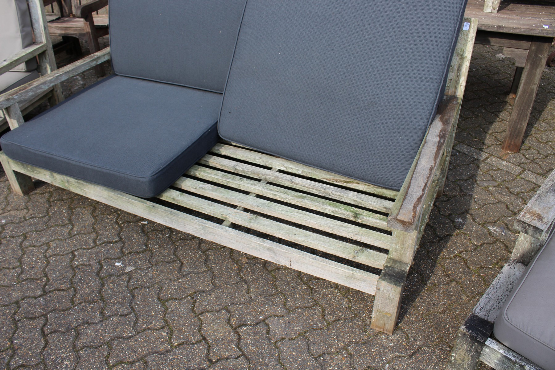 A large teak garden settee with a pair of lounger style armchairs with loose cushions. - Image 3 of 4