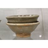 Two early Chinese glazed terracotta bowls.