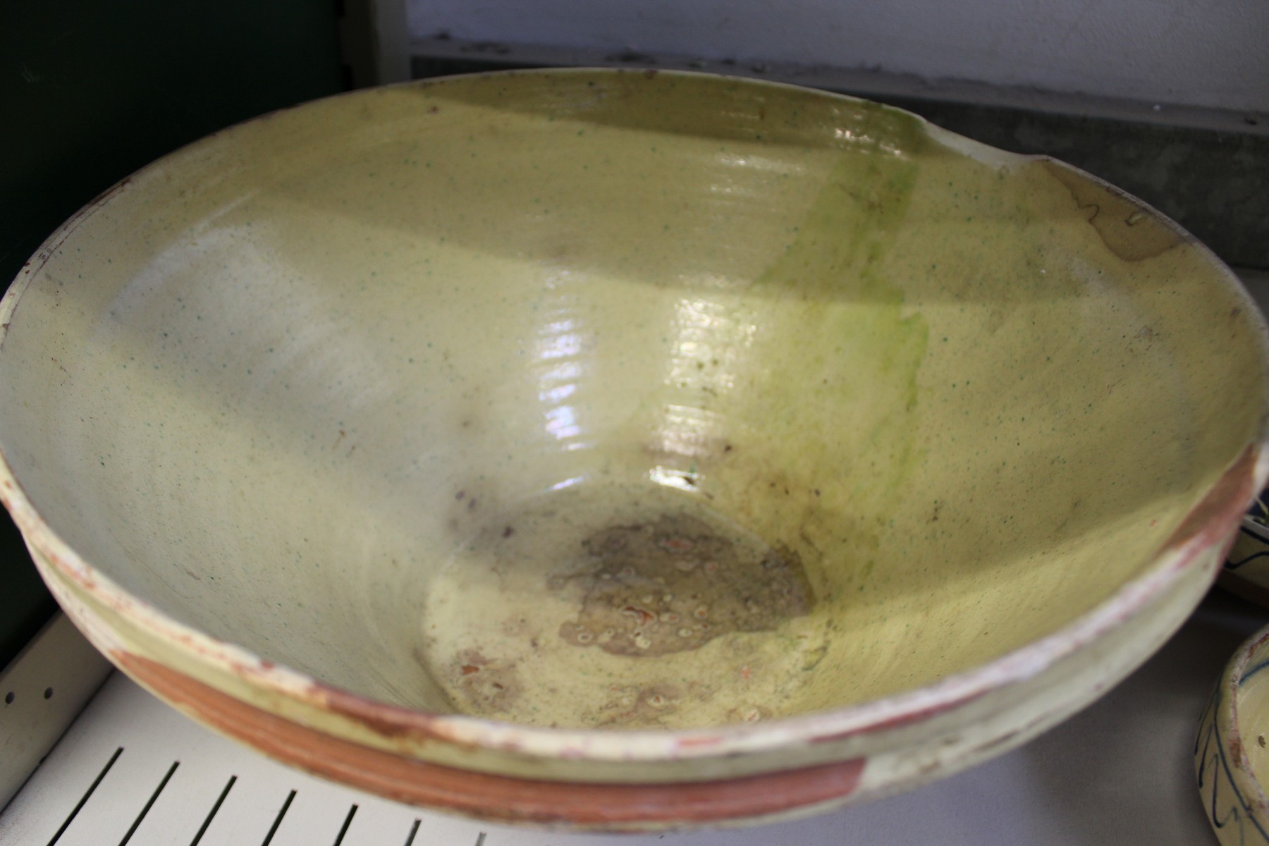 A part glazed terracotta bowl and a set of four hand painted bowls. - Image 3 of 3