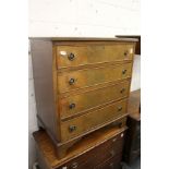 A small mahogany four drawer chest.