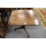 A 19th century mahogany tripod table.