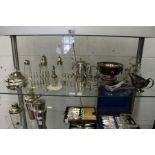 A shelf of plated wares.