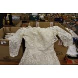 A lace wedding dress etc.