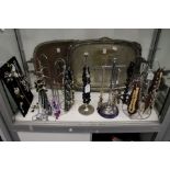 A large quantity of costume jewellery, mostly necklaces, complete with necklace stands.