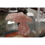 A Chinese carved rose quartz figure of a fish.