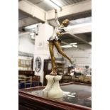 An Art Deco cold painted bronze and onyx figure of a dancer (AF).
