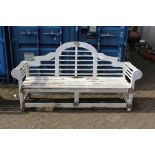 A Lutyens style painted large garden bench.