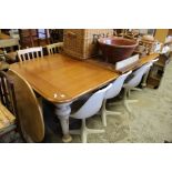 A good large pine and painted kitchen table with extra leaf.