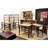 A good, unusual set of six 19th century ash spindle back dining chairs with rush seats.