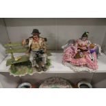 A Capodimonte tramp on a bench and a porcelain figural group.