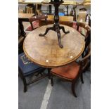 A Victorian figured walnut oval tilt top breakfast table.